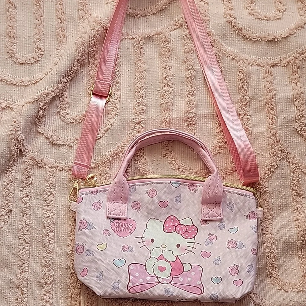 Hello Kitty Handbag with adjustable shoulder strap, pink 💗. NWOT.